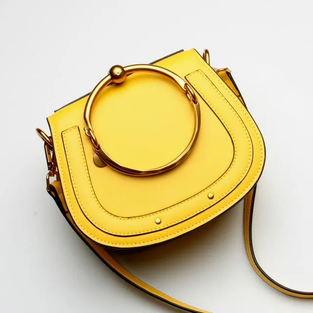 Women Saddle Faux-Leather Bag with Brass Buckle Design